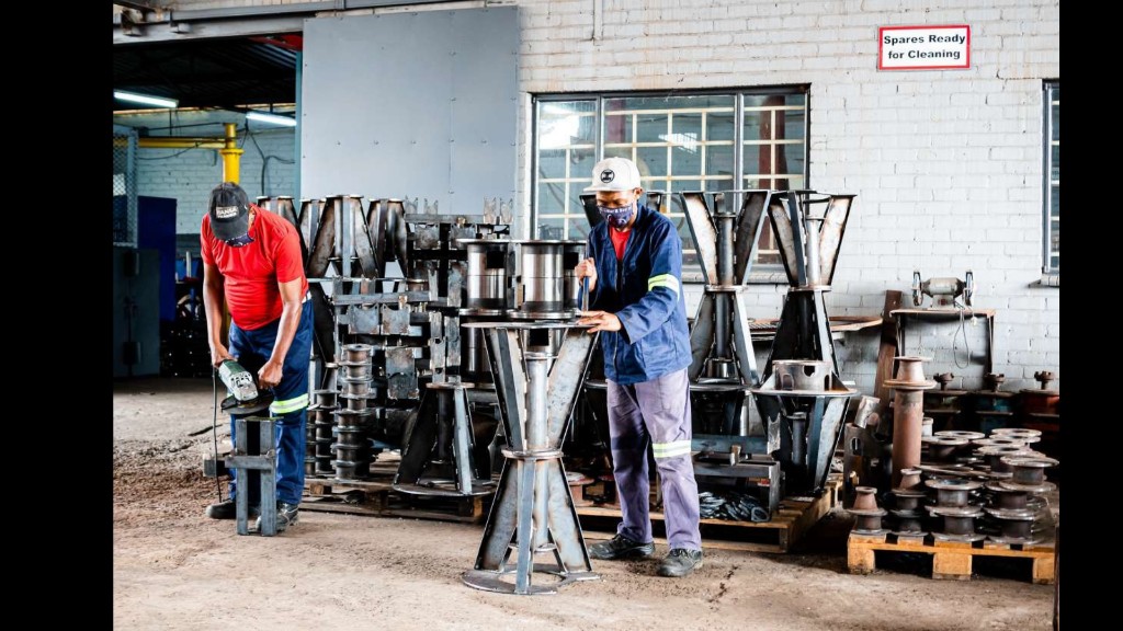 Titan Pumps workshop fabricating and assembling custom industrial pump components and metal structures